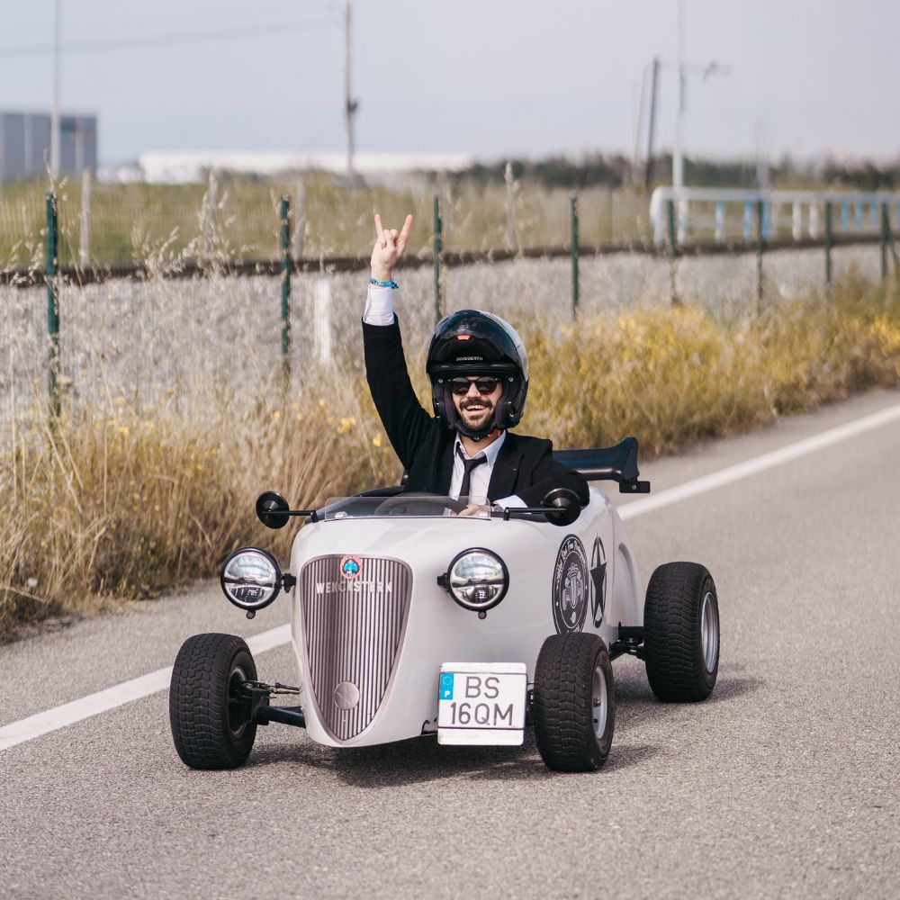 Participant driving a Hot Rod during a 1-hour tour with Hot Rod Fun Portugal